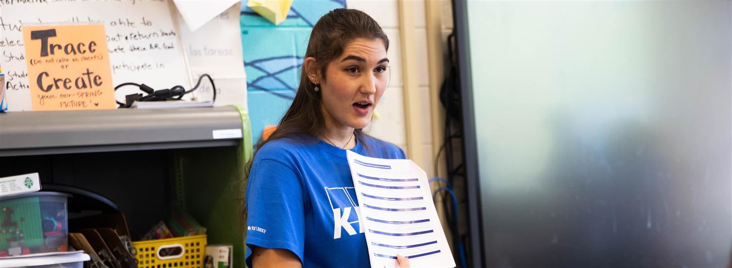 Teacher holding paper